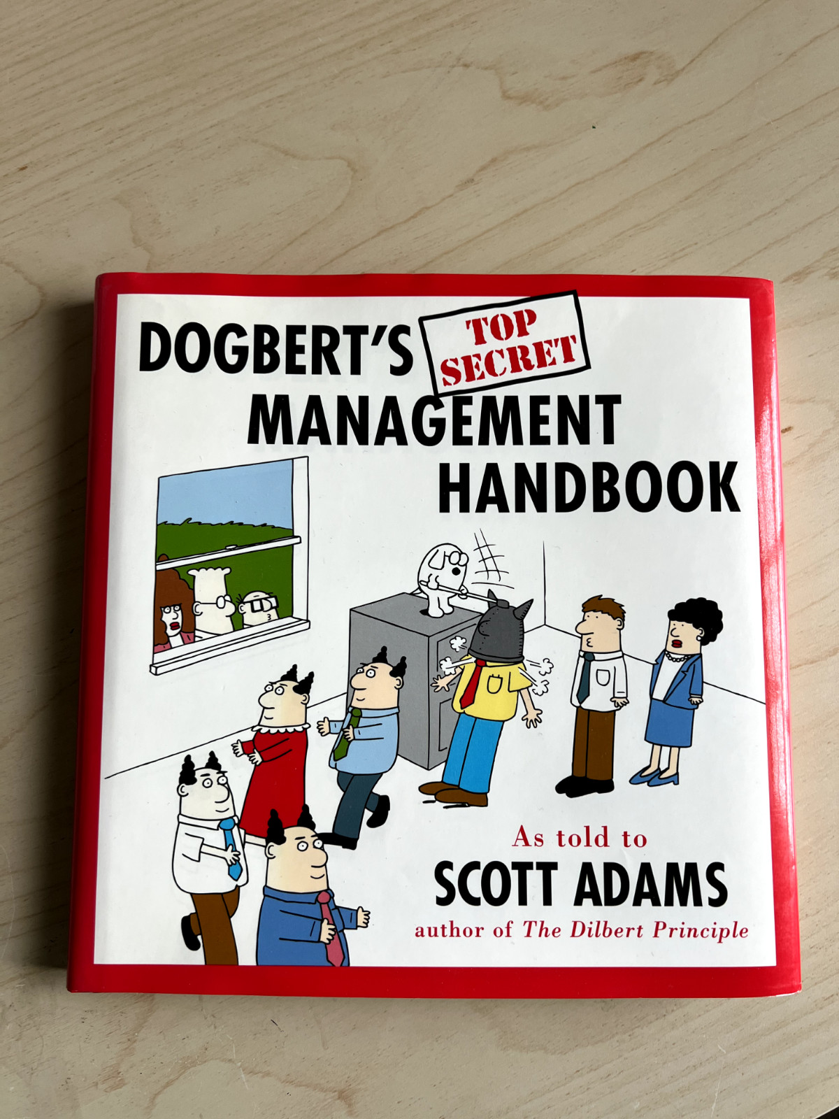 Dogbert’s Management Handbook, by Scott Adams – Hardcover