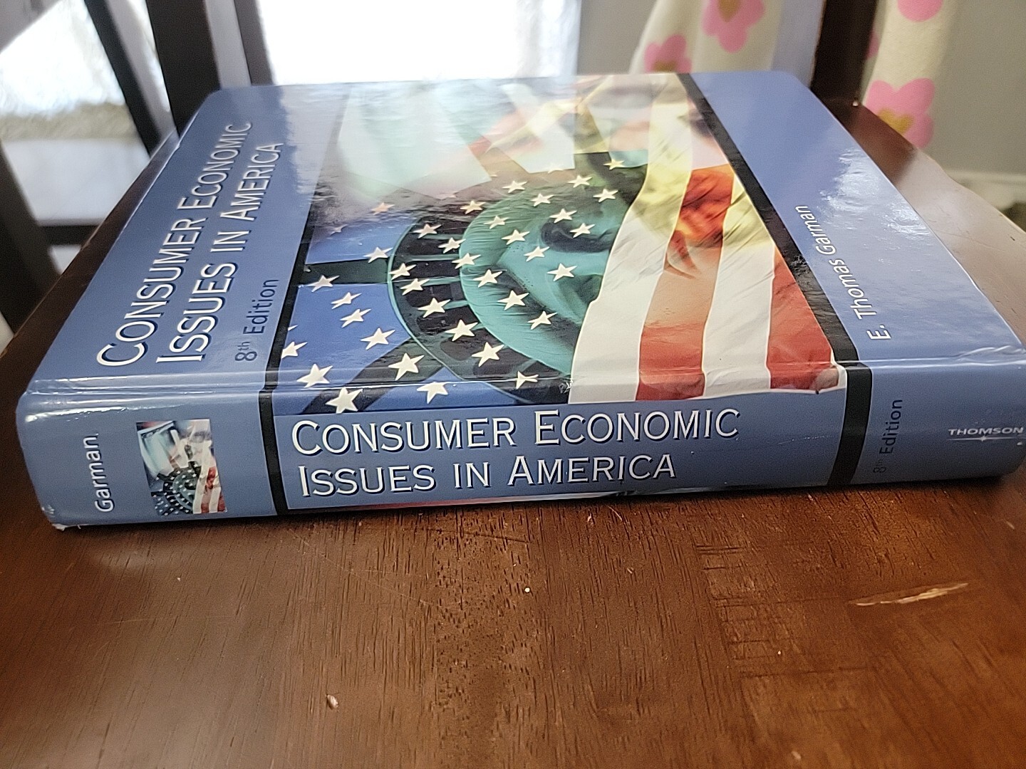 Consumer Economic Issues In America 8th Edition E. Thomas Garman Thompson 2003