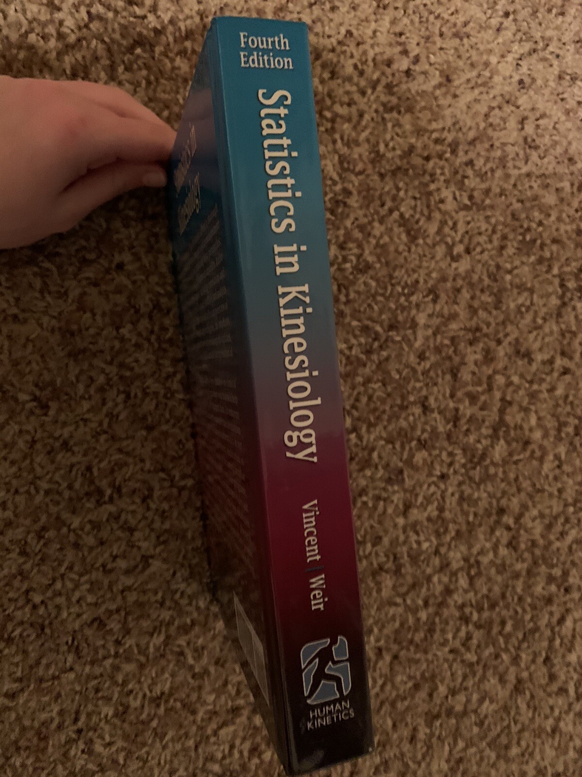 Statistics in Kinesiology by Joseph P. Weir and William J. Vincent (2012)