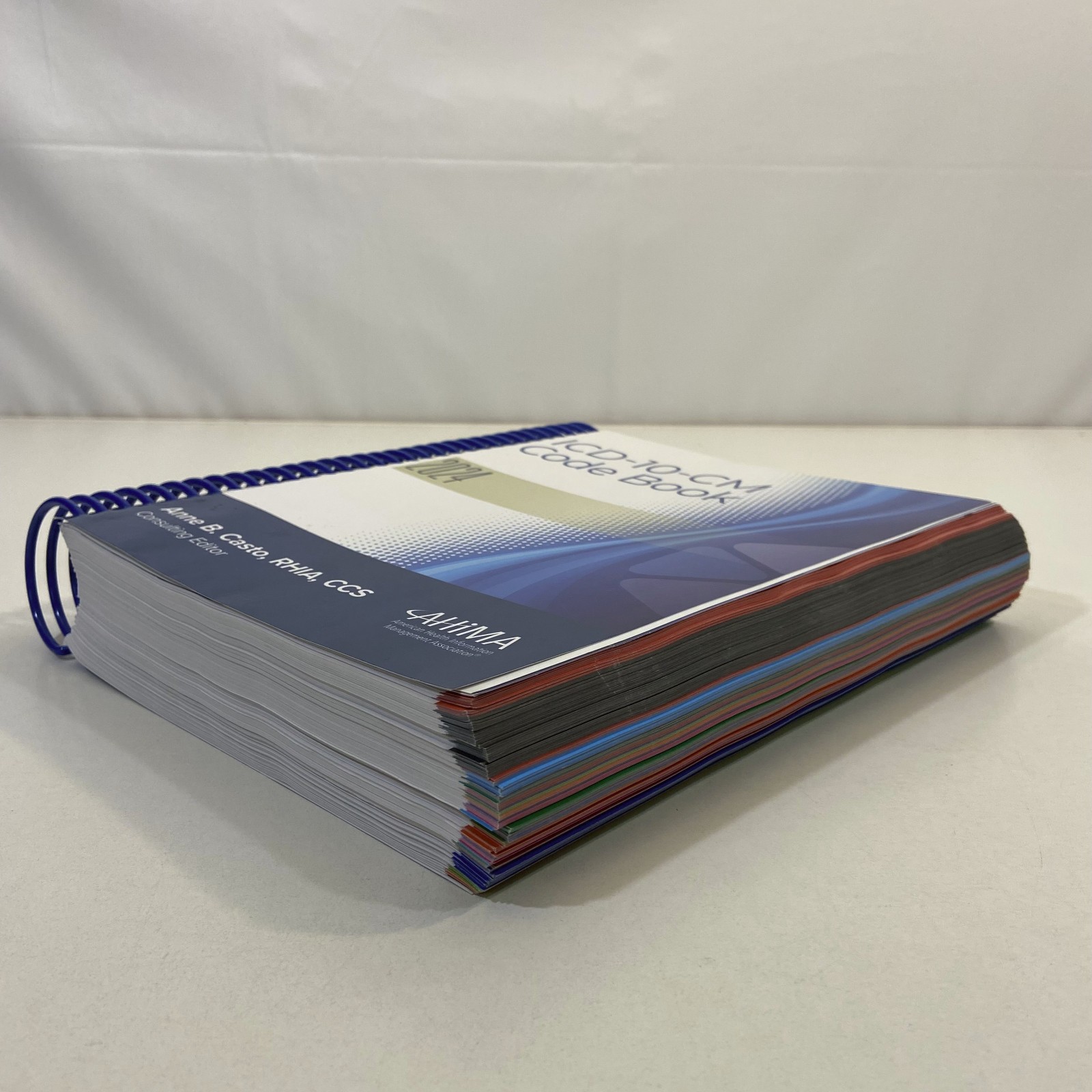 ICD-10-CM Code Book 2024 AHIMA Press Anne B Casto Spiralbound Unused Color Flags