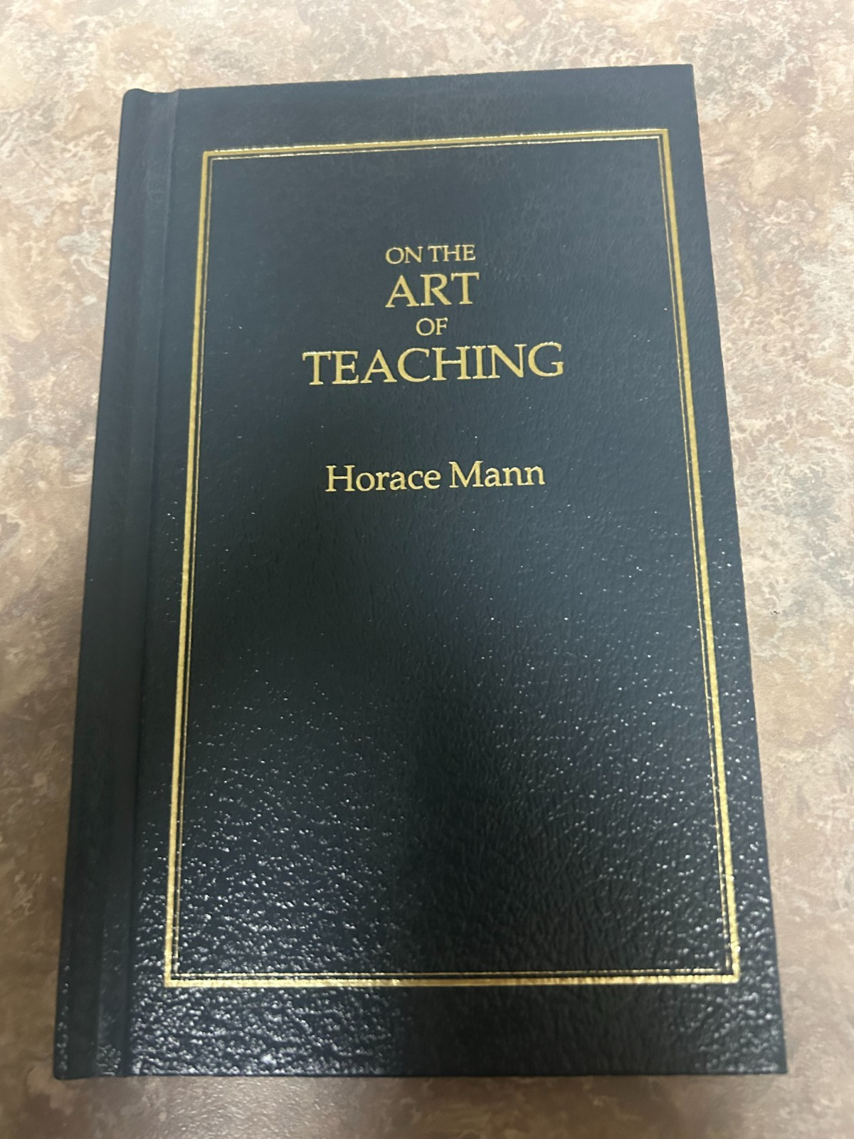 On the Art of Teaching by Horace Mann, leather book with gold writing, HB