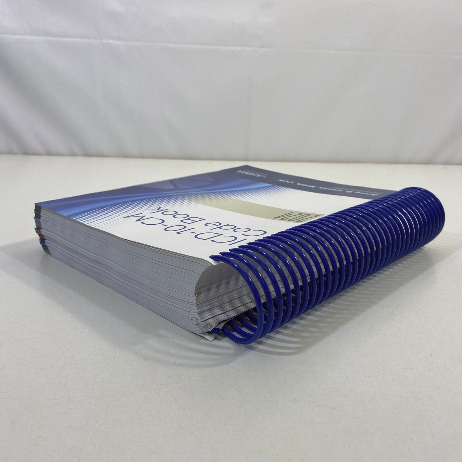 ICD-10-CM Code Book 2024 AHIMA Press Anne B Casto Spiralbound Unused Color Flags