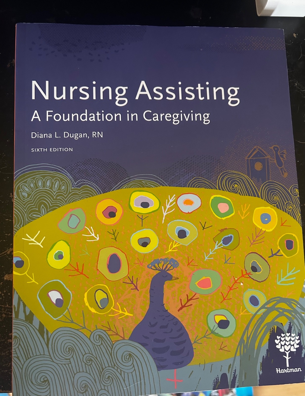 Nursing Assisting: A Foundation in Caregiving, 6e – Paperback – GOOD