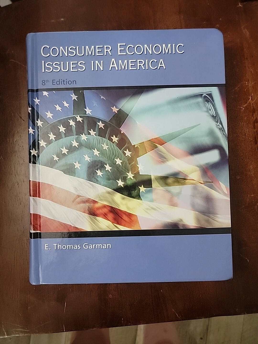 Consumer Economic Issues In America 8th Edition E. Thomas Garman Thompson 2003